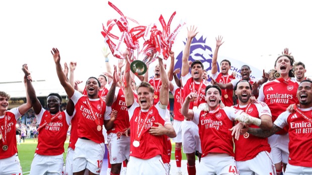 Arsenal lifting the 2026 Premier League trophy